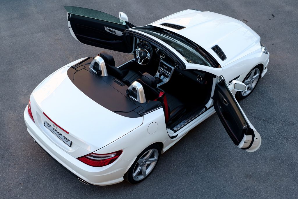 White Mercedes-Benz Convertible top view with doors opened